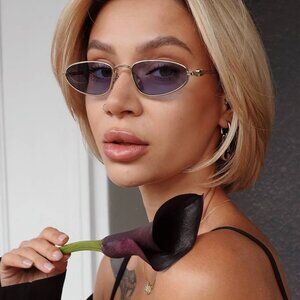 Miu Miu MUA52S ZVN60O Sunglasses Gold Cat Eye Frame, Blue Lenses